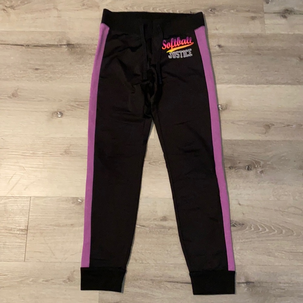 Joggers, with words softball justice